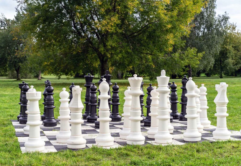 Photo of oversized backyard chess game